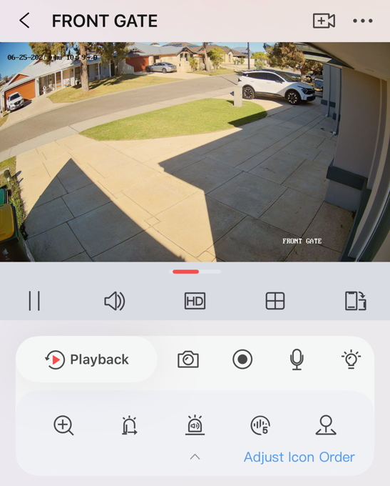 The Hik-Connect live view screen showing a camera picture with the button toolbars below it.